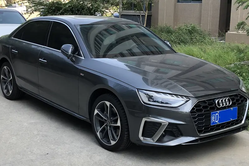 Grey Audi A4 saloon, front three-quarter view