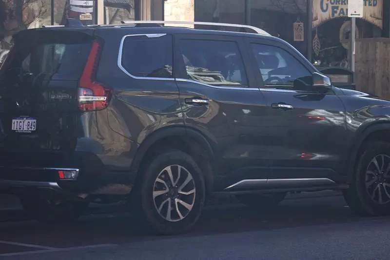 Dark Mahindra Scorpio N SUV, rear three-quarter view