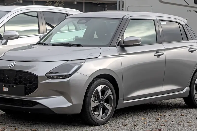 Silver Maruti Suzuki Swift hatchback, front three-quarter view