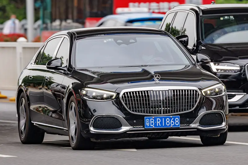 Black Mercedes-Maybach saloon with its vertical chrome grille