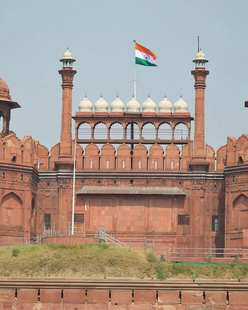 The Lahori Gate of the Red Fort in Delhi under a blue sky