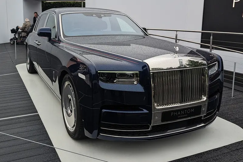 Dark Rolls-Royce Phantom with its Pantheon grille on display